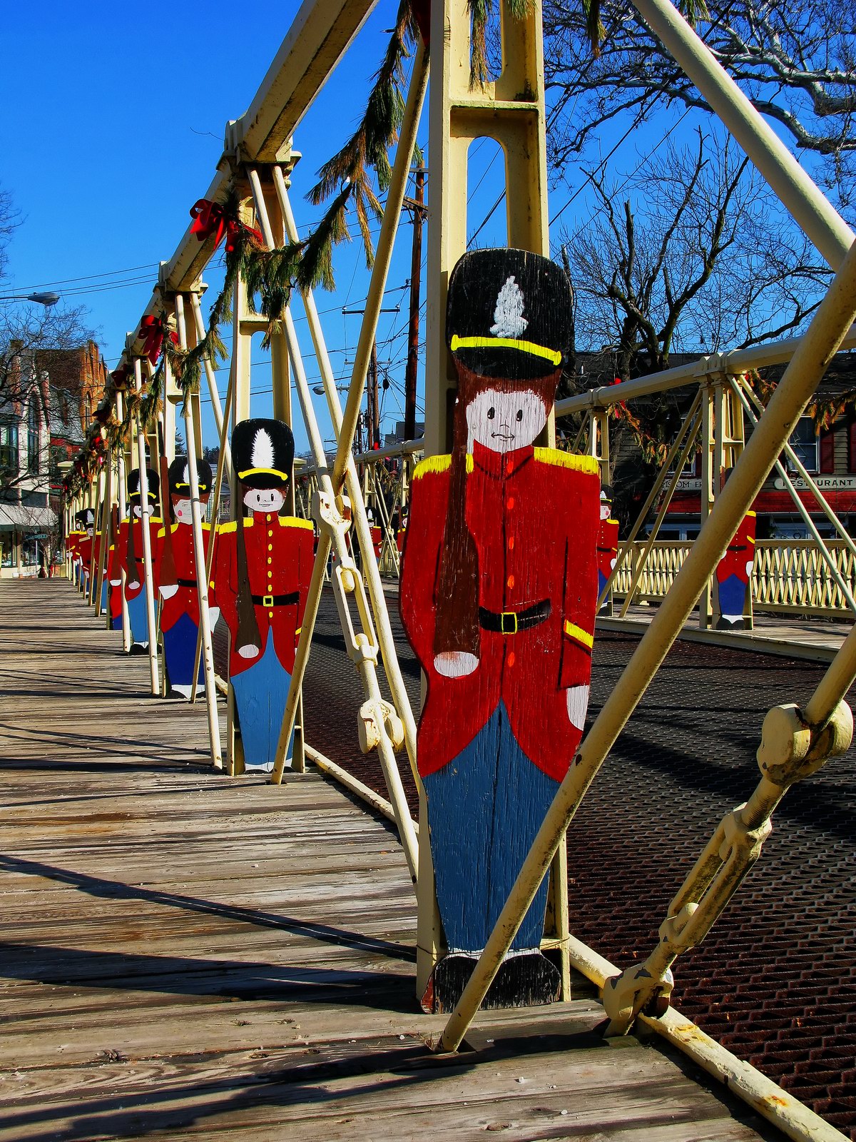 Wooden Toy Soliders guard the bridge during the holiday season.