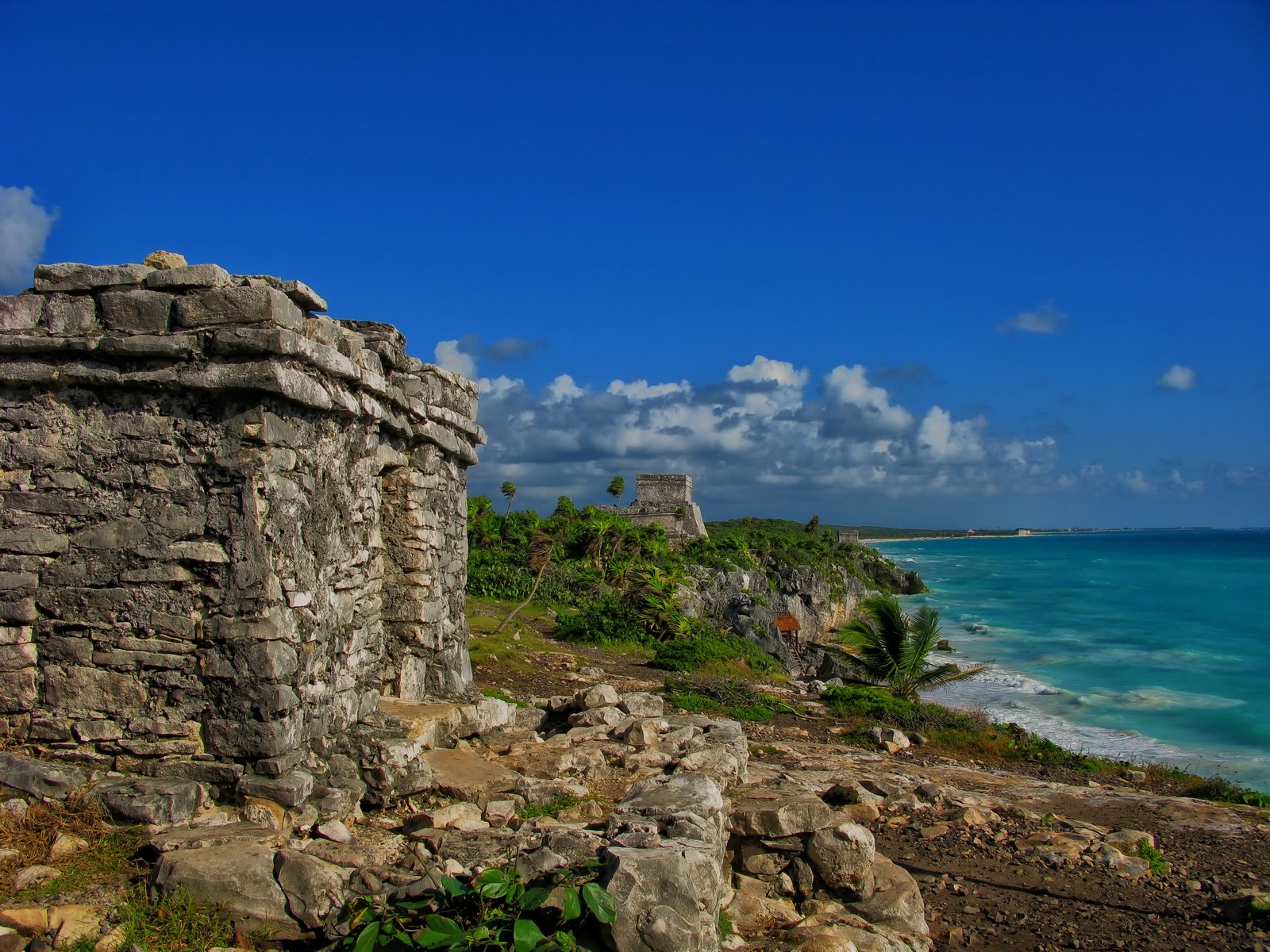 The temple faces the sea offering prayers from its one room altar.