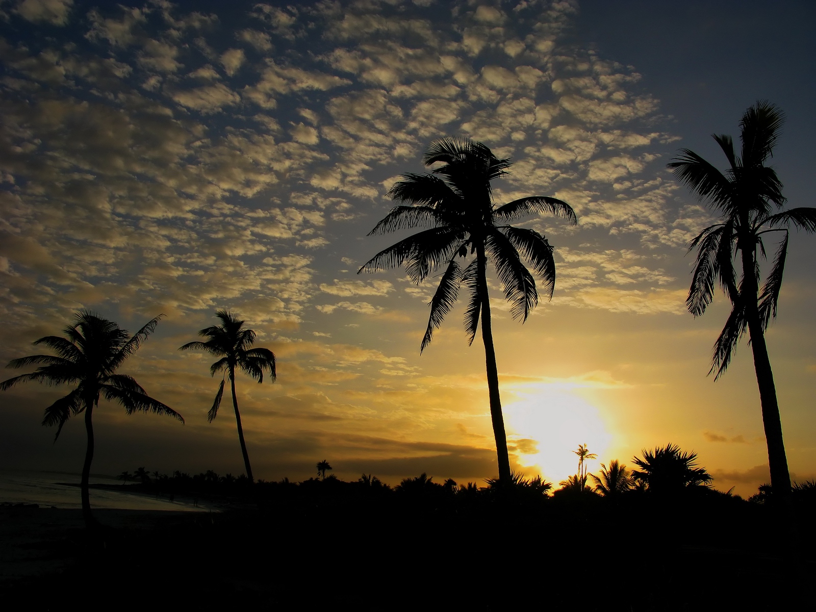 A sunset view looking towards the ancient Mayan city of Tulum.